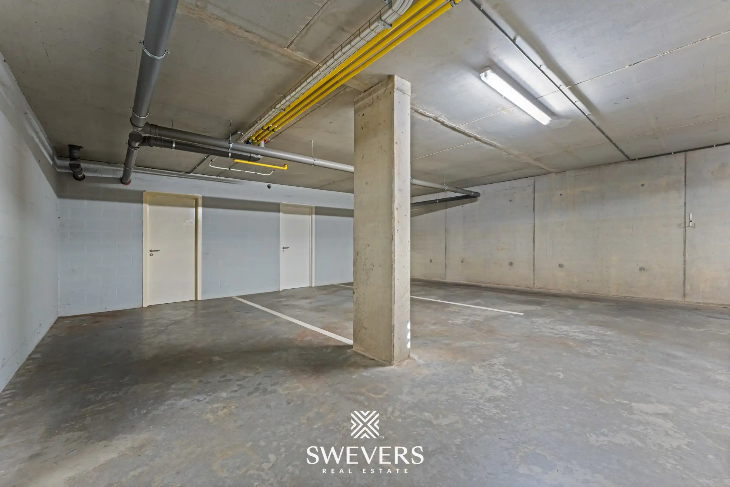 Appartement met twee autostaanplaatsen en terras met uitzicht op prachtige binnentuin foto 13