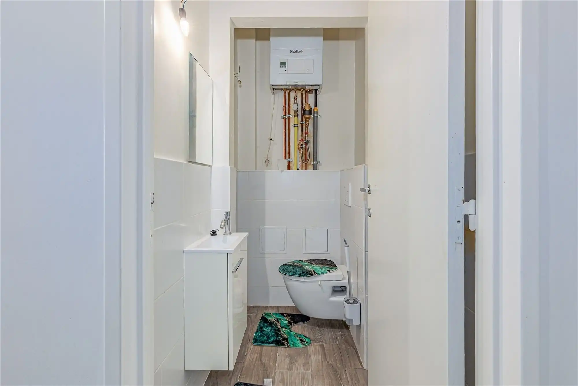 Vergund appartementsgebouw met 3 appt, handelsglvl en tuin in Merksem! foto 10