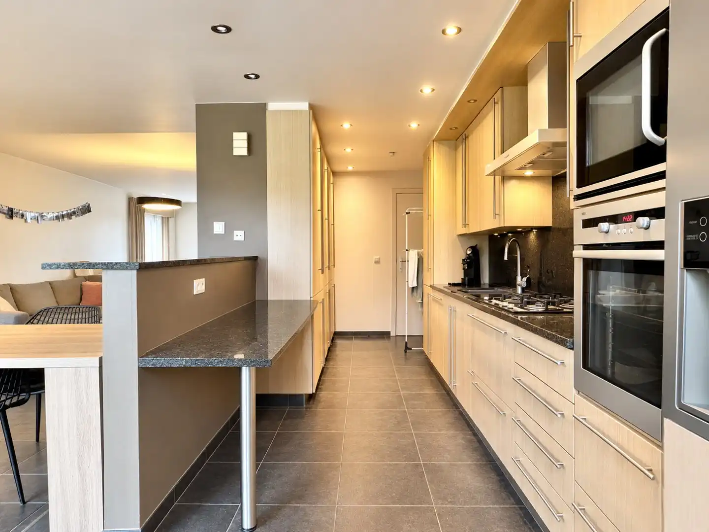 Instapklare woning met 2 slaapkamers, tuin en garage te huur in rustige woonwijk te Hulste! foto 11