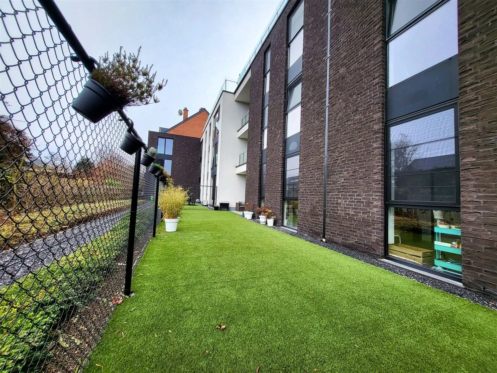 Gelijkvloers appartement met tuin! foto 17