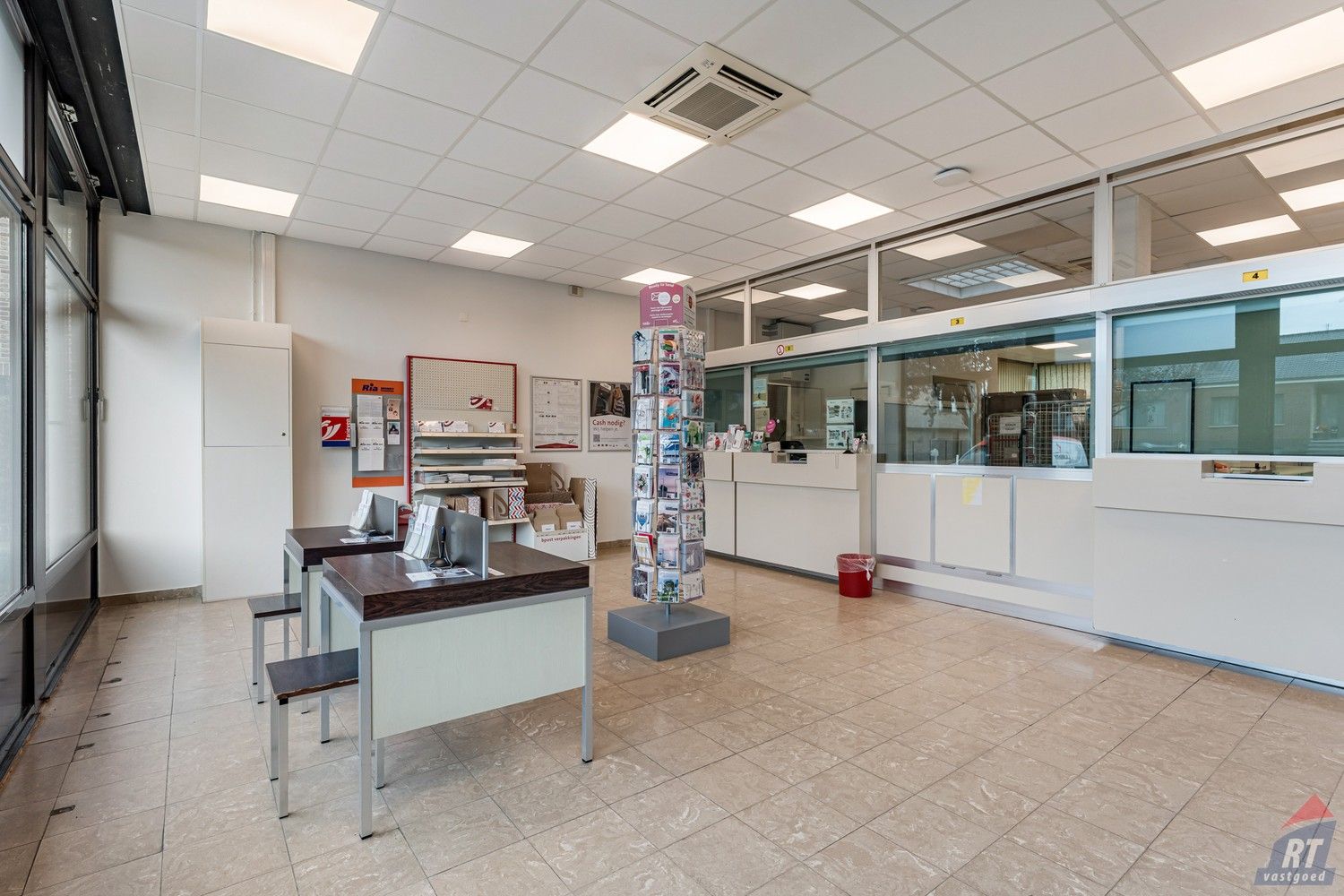 Opbrengsteigendom bestaande uit 2 handelsruimtes en een ruim appartement foto 2