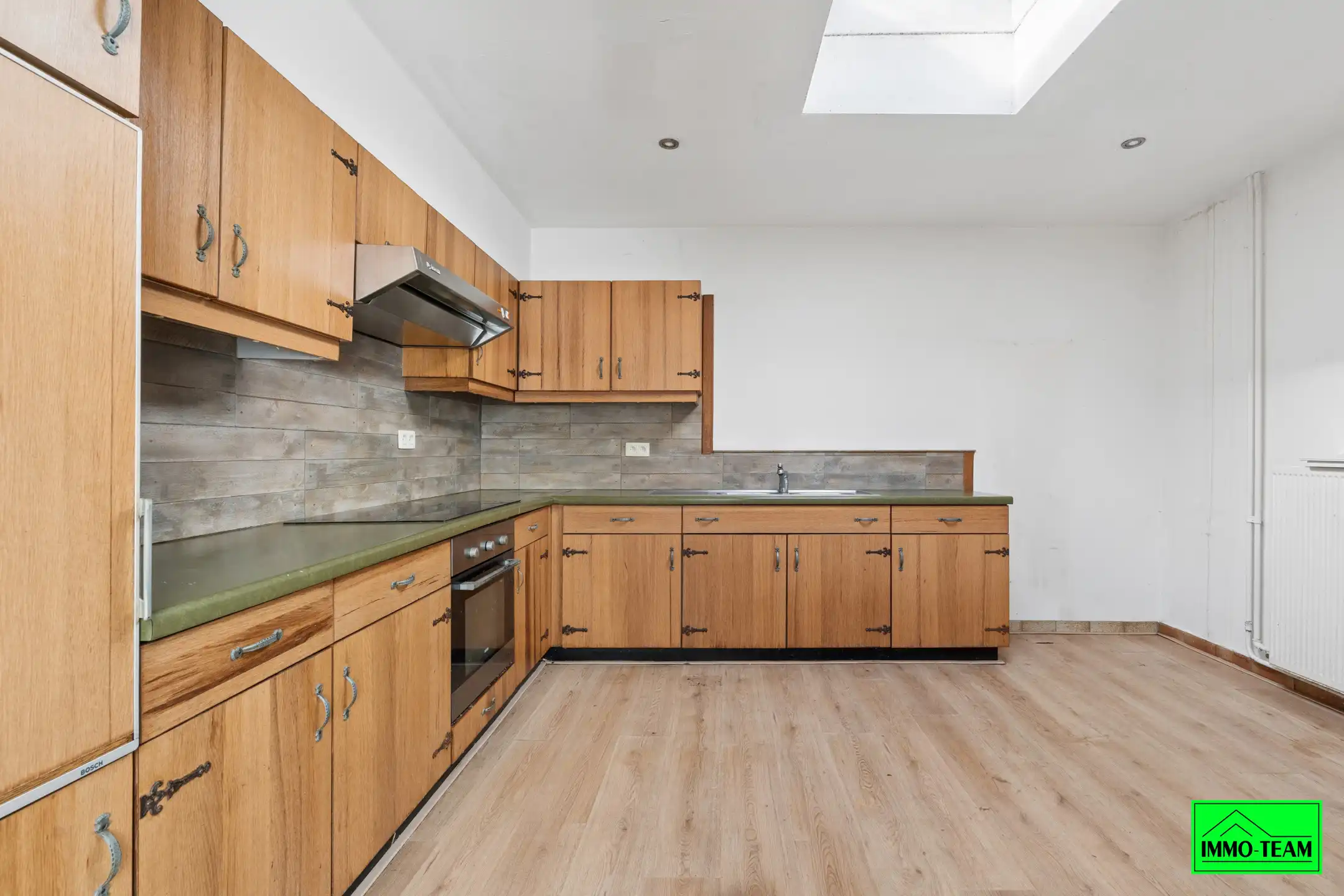 Te renoveren woning in rustige straat in Asse foto 3