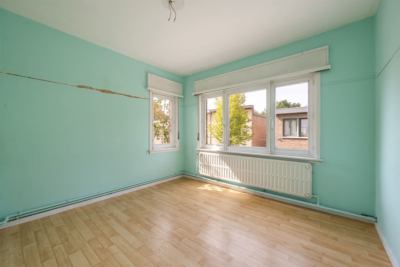 Halfopen woning in kindvriendelijke straat foto 15