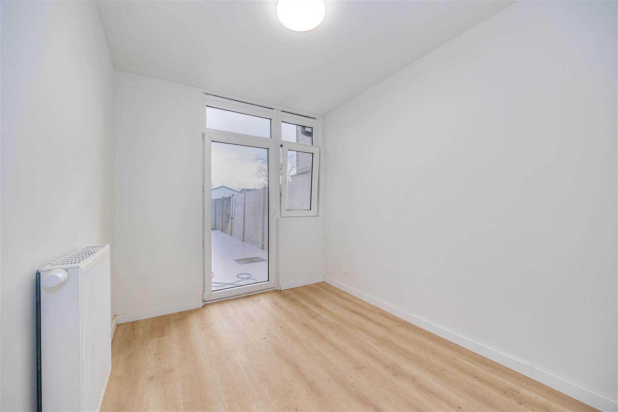 Gelijkvloers instapklaar appartement met tuin foto 7