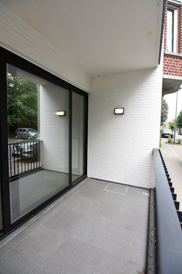 Modern gelijkvloers appartement tegenover park Pastoorsbos Beveren foto 4