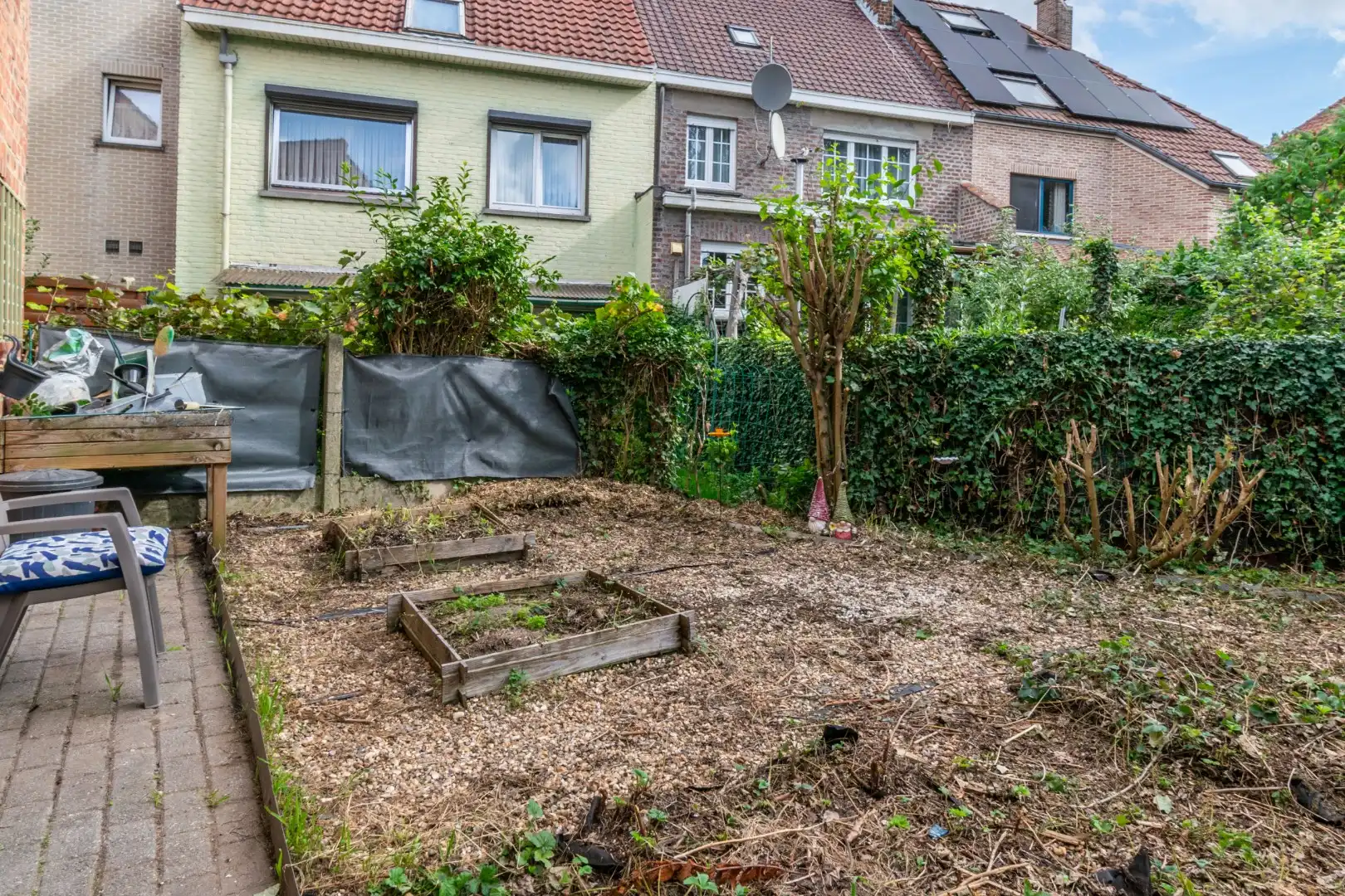 OPBRENGSTGEBOUW MET 2 APPARTEMENTEN, GARAGE & TUIN ! foto 4