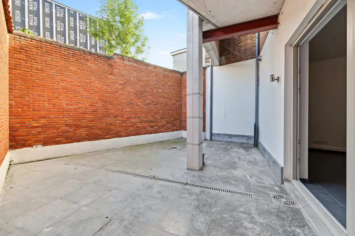Volledig gerenoveerd gelijkvloers appartement met privatief terras in het hart van Kruibeke foto 13
