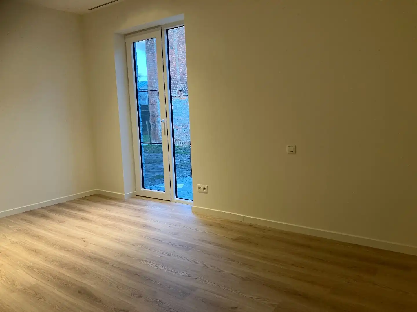 Nieuw gelijkvloers 1-slaapkamerappartement met autostaanplaats en berging! foto 13