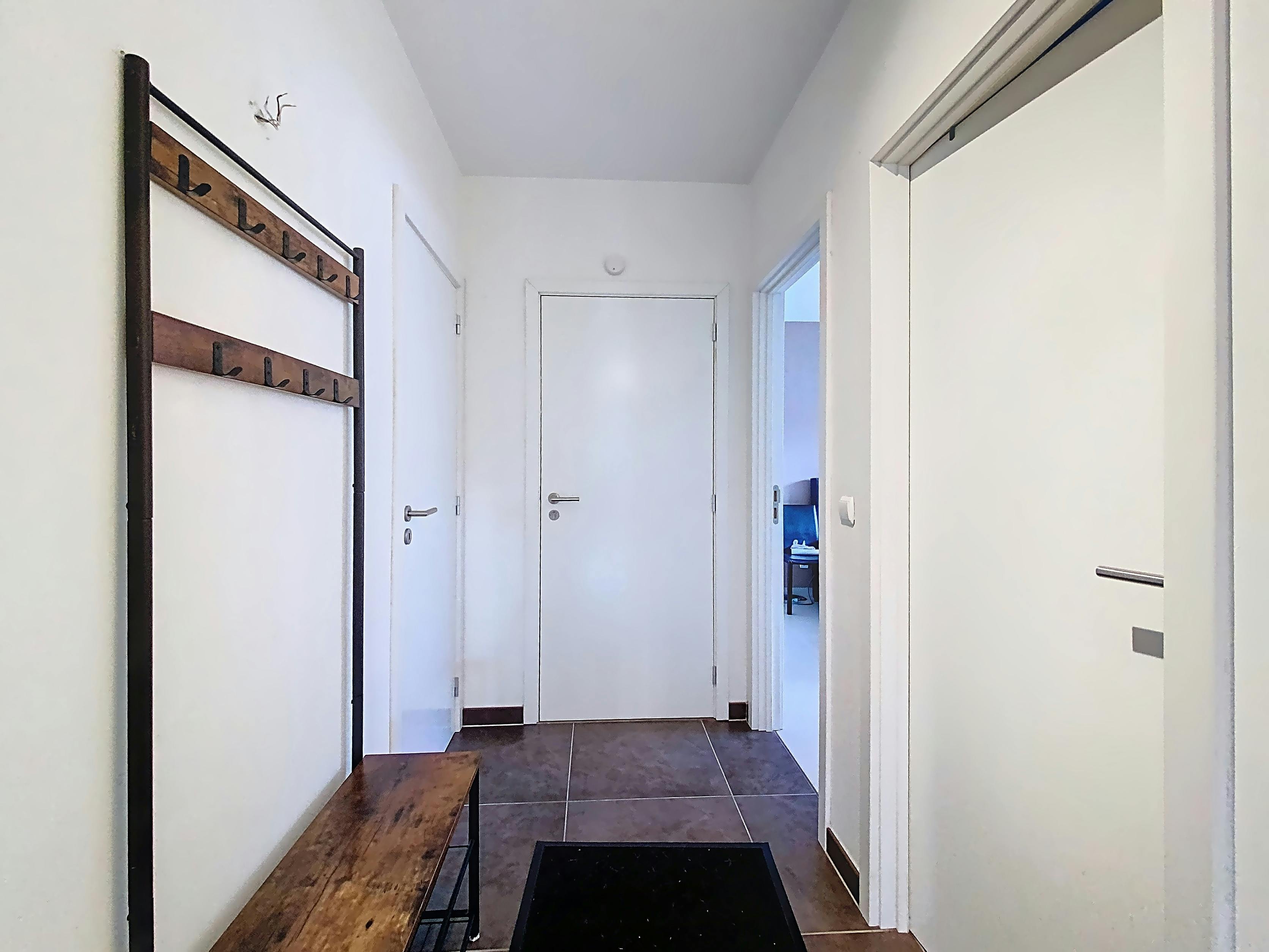 Gezellig gelijkvloers appartement met 2 slaapkamers en tuin foto 11
