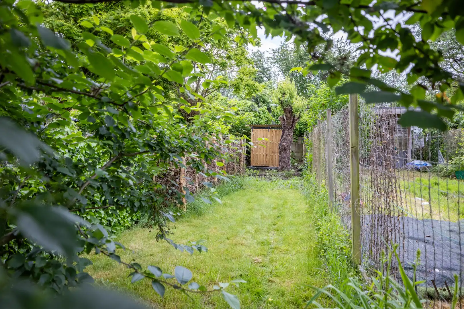 Charmante rijwoning met zonnige tuin in hartje Heverlee foto 8