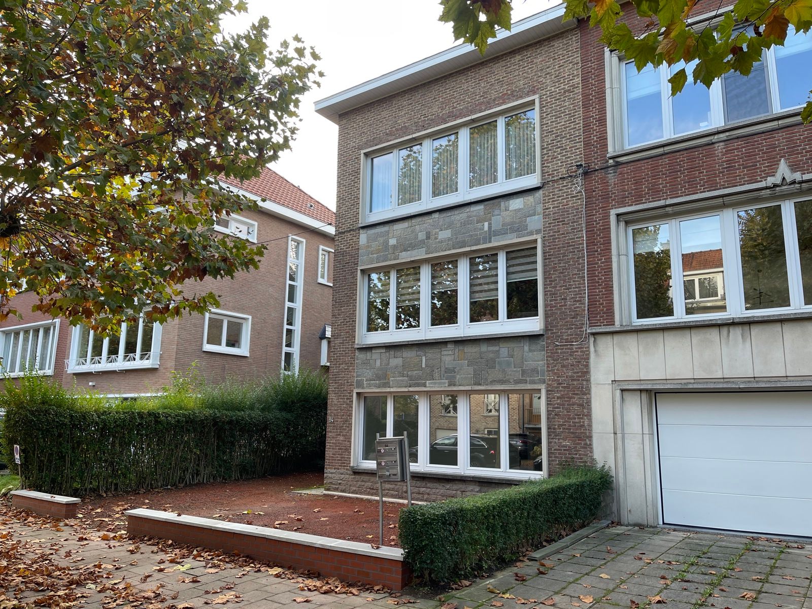 Opbrengsteigendom met 3 appartementen en tuin foto 2