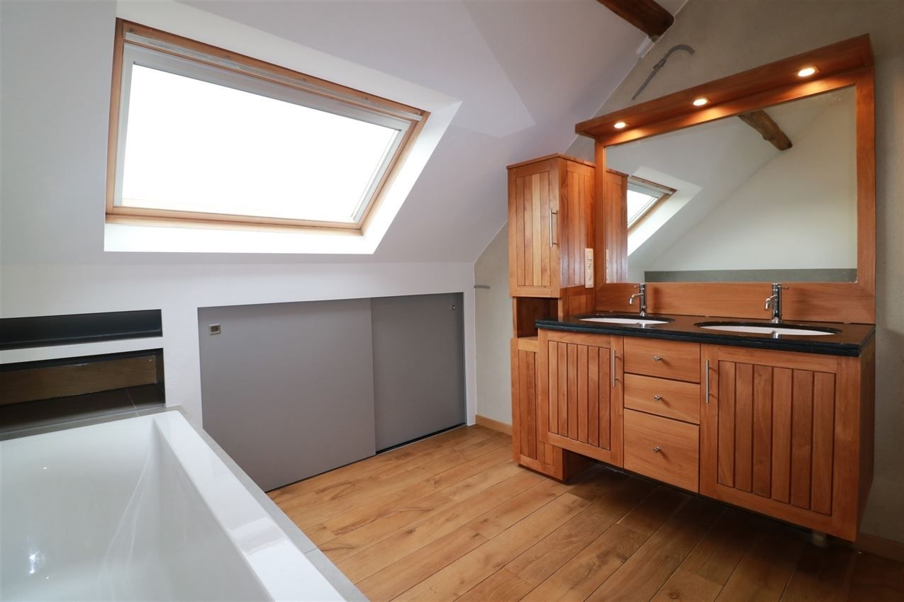 Architecturaal plaatje met 4 slpk., garage en riant terras foto 37