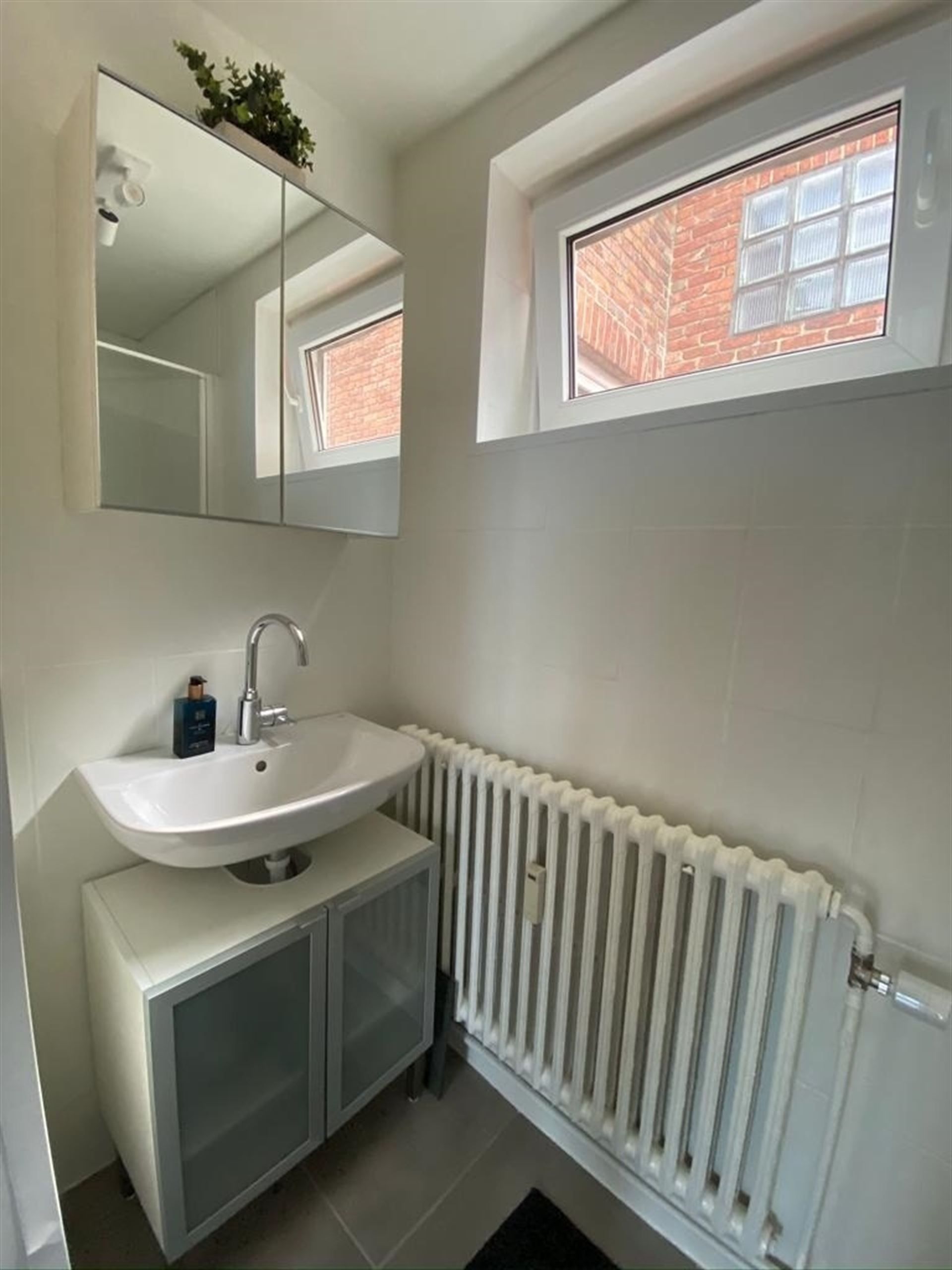 Gerenoveerd appartement met autostaanplaats in Mechelen foto 14