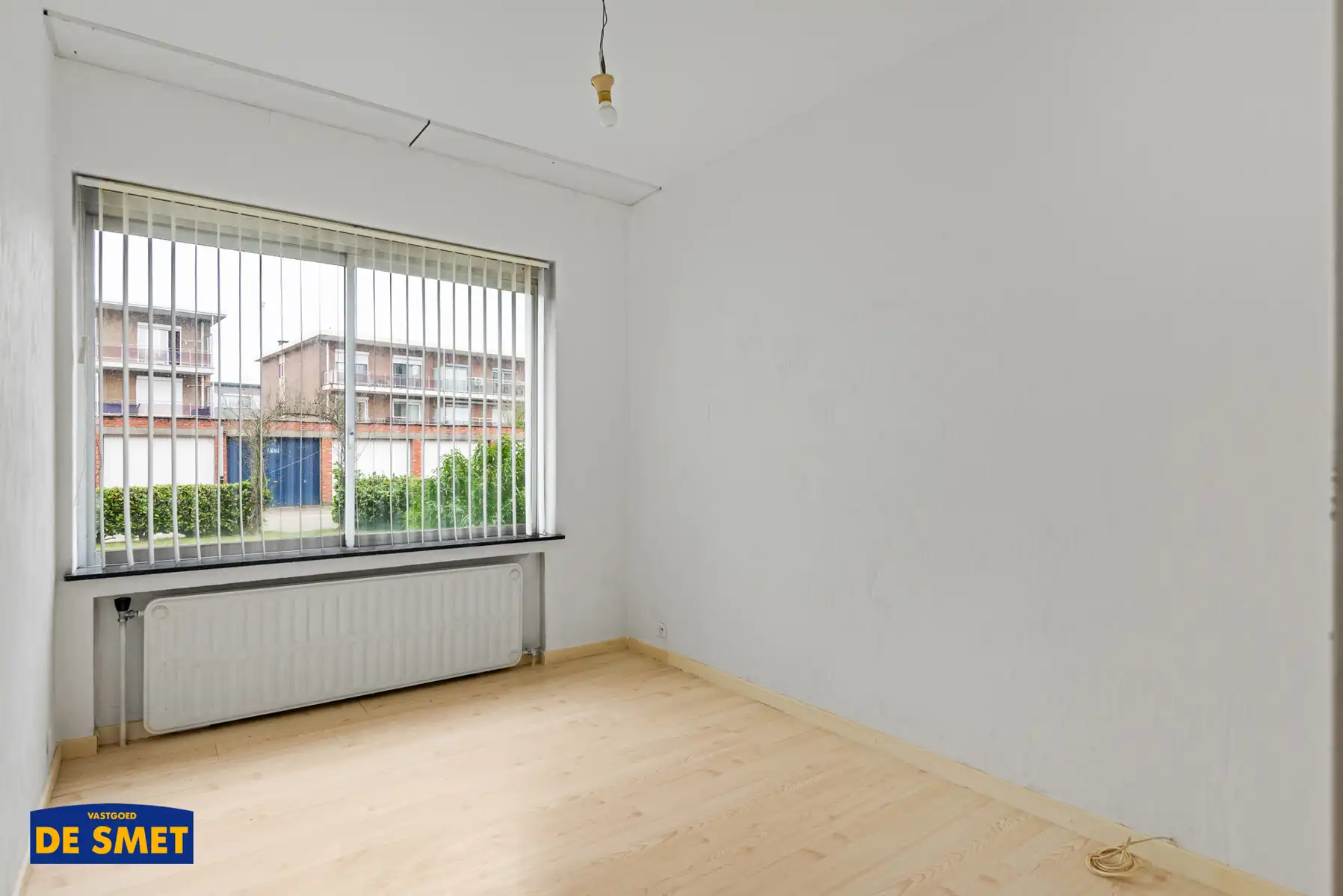 Te renoveren gelijkvloers appartement zonder lift met kelder foto 12