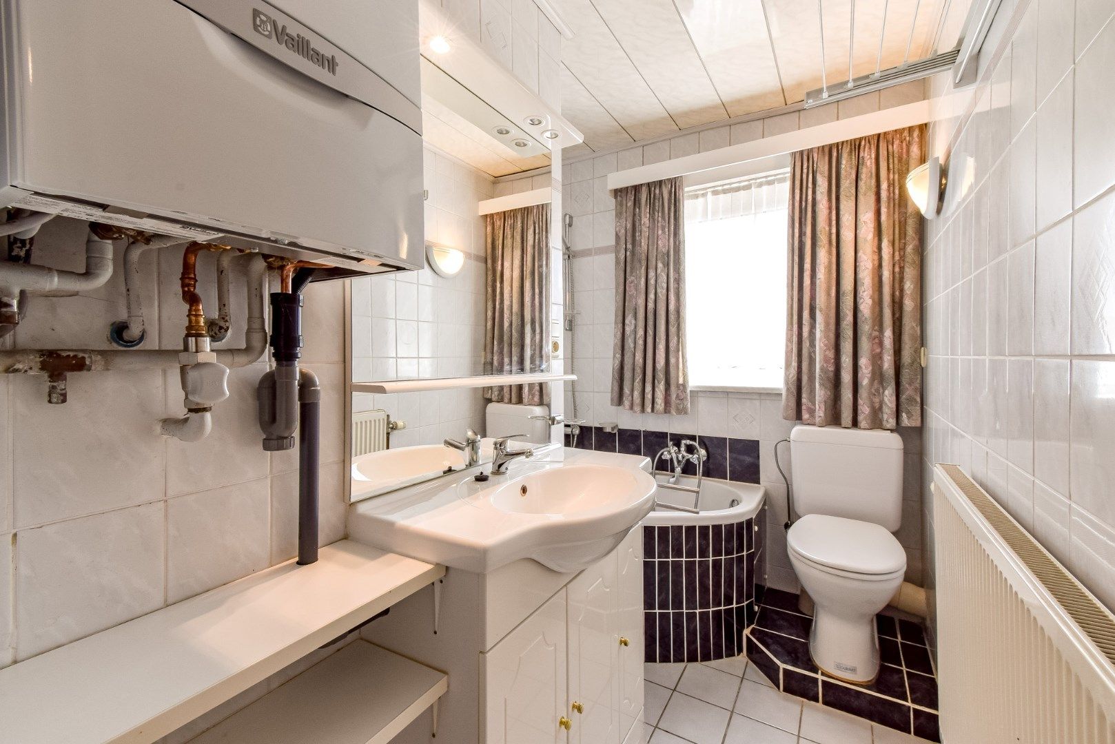 Charmante rijwoning met 3 slaapkamers en zonnige achtertuin in rustige woonwijk te Gistel foto 14