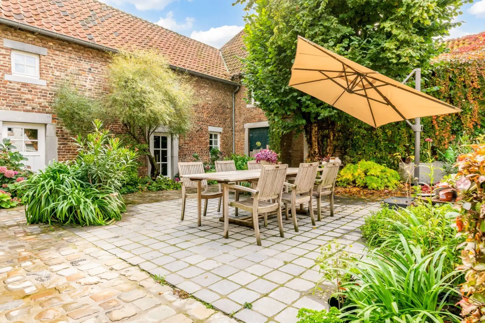 Charmante hoeve met prachtige binnenkoer + 2 gastenverblijven te Tongeren-Rutten foto 4