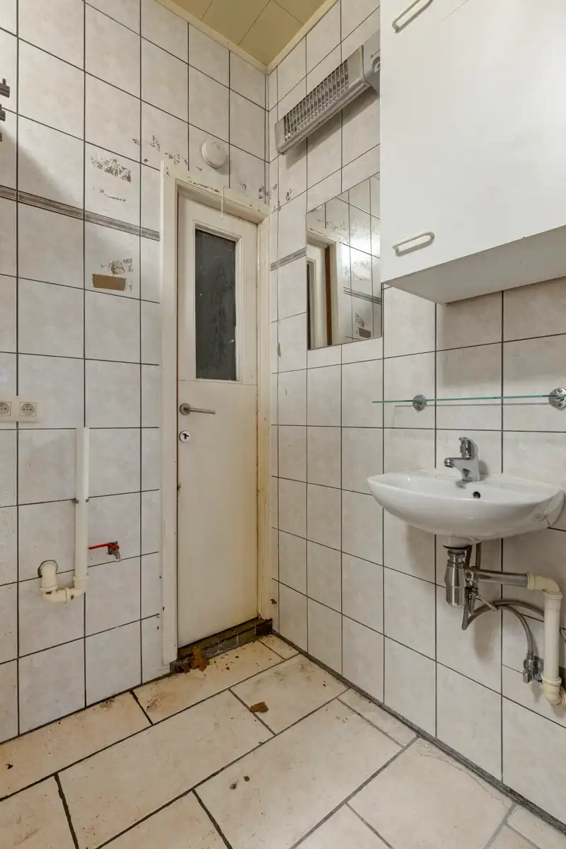Op te frissen woning zonder renovatieverplichting foto 13