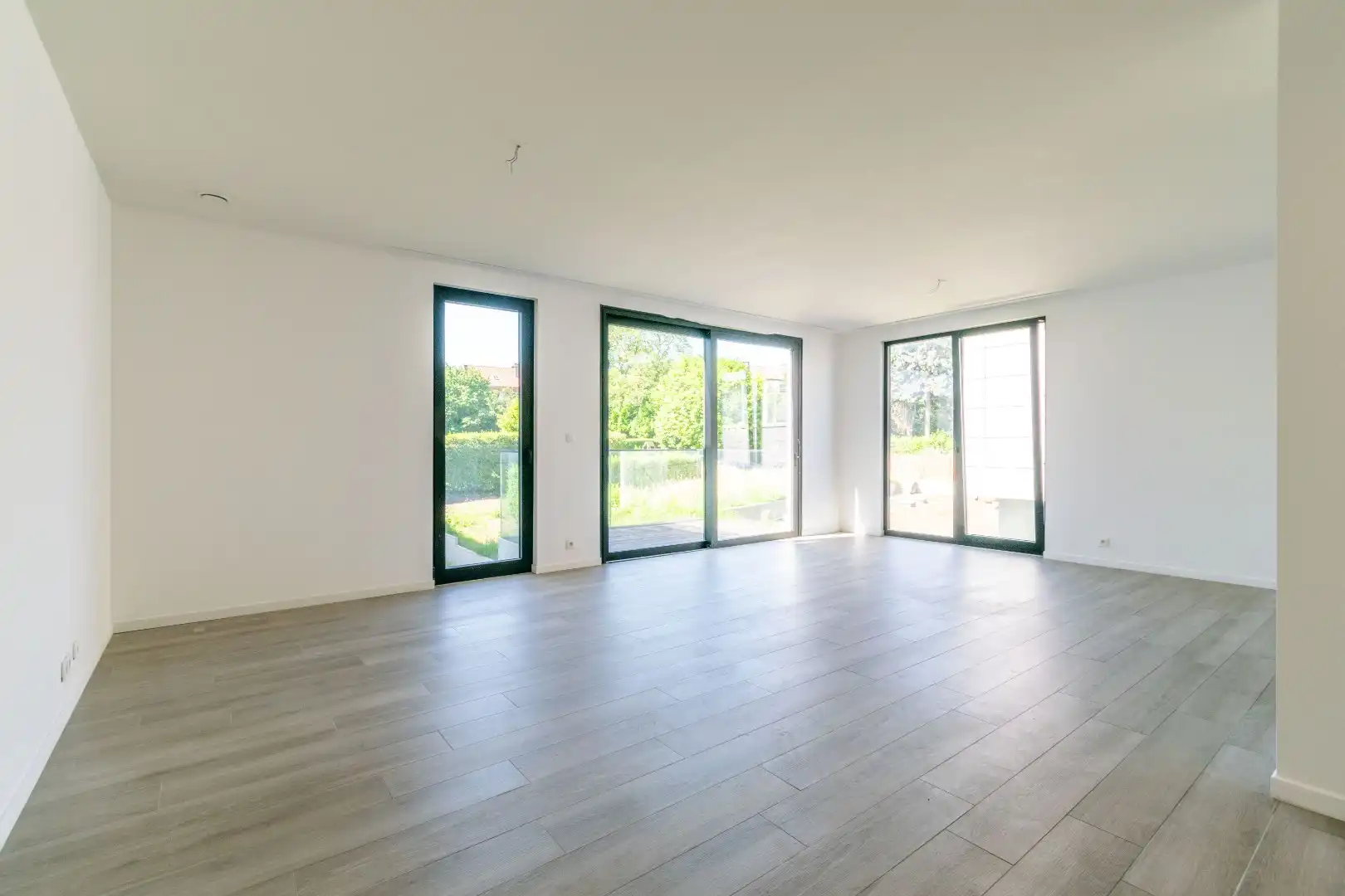 Een ruim (116m²), recent nieuwbouwappartement te Dilbeek! foto 4