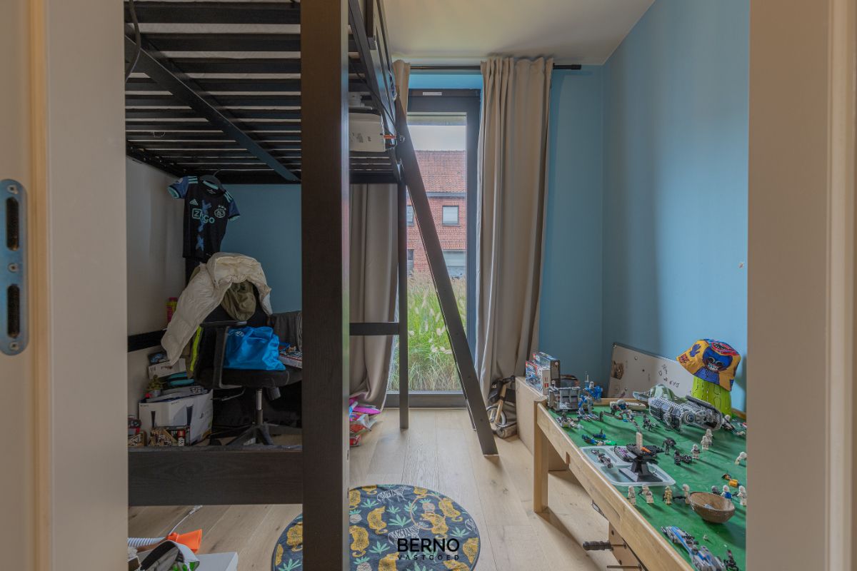 Recent gelijkvloers appartement met zonnig terras en tuintje in Opstal foto 12