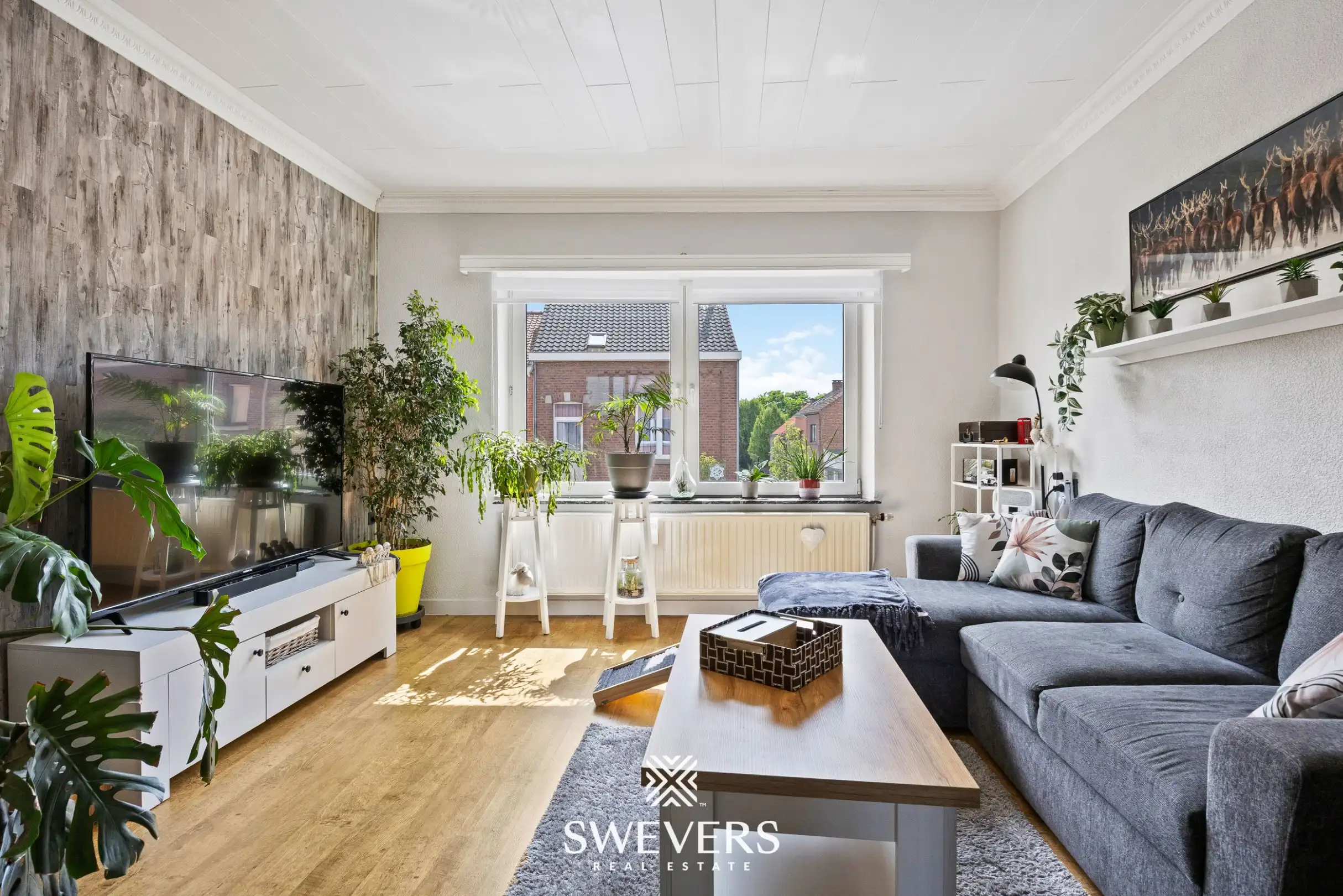 Ruim instapklaar appartement met 3 slaapkamers, garage en terras van 42 m² in Tongeren. foto 2