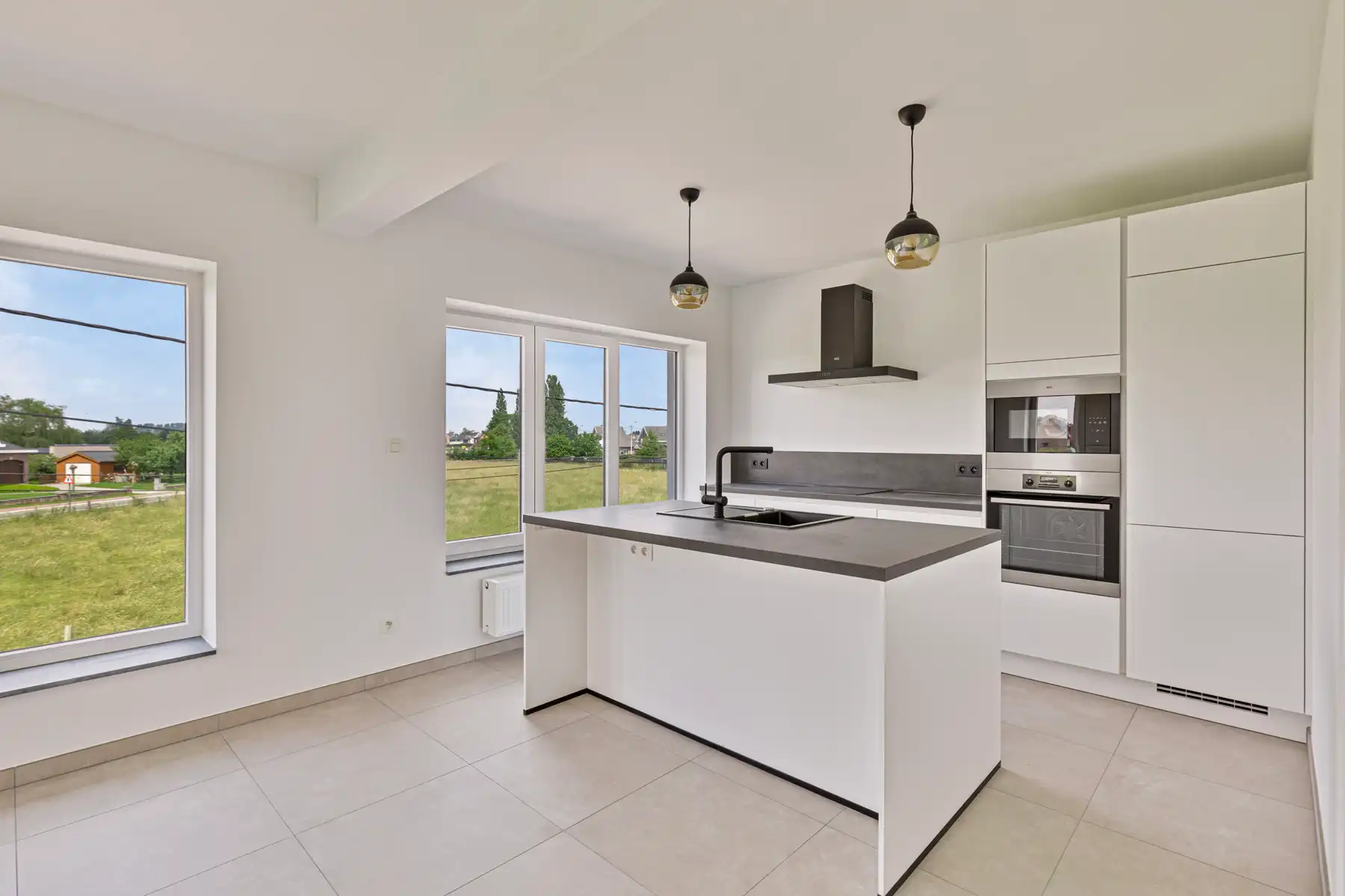 Duplex appartement met 4 slpk en 2 badkamers, tuin en garage foto 5