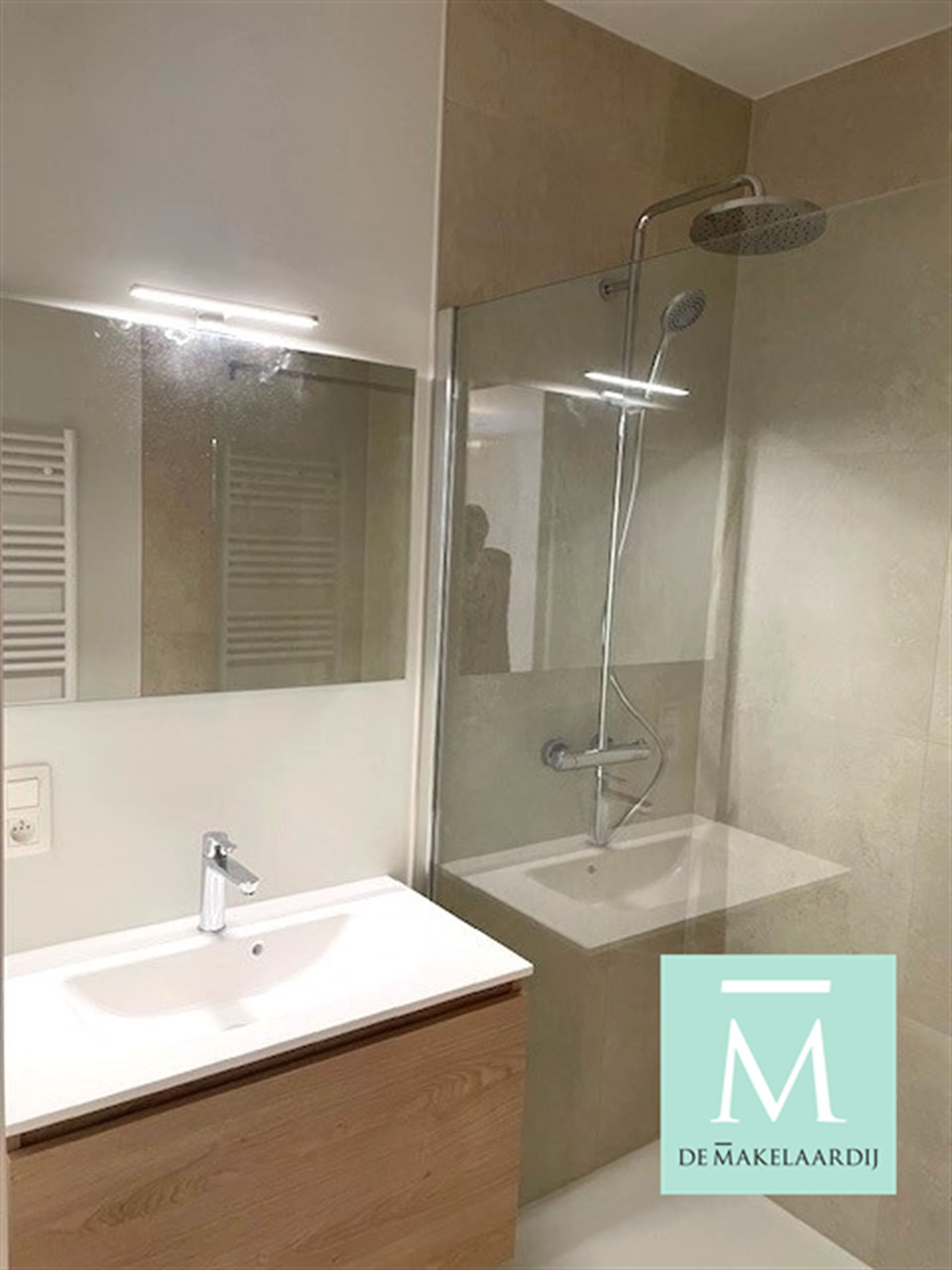 Gelijkvloers nieuwbouwappartement met 2 slaapkamers, terras/tuin op toplocatie! foto 7