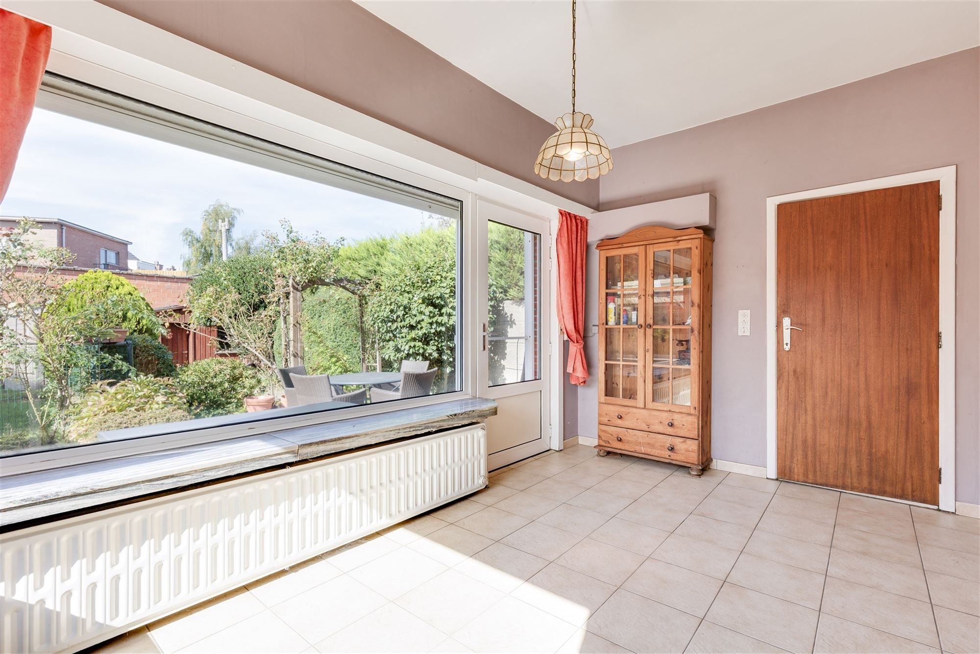 Te renoveren woning met 3 slpk, terras en ruime tuin in Wommelgem! foto 9