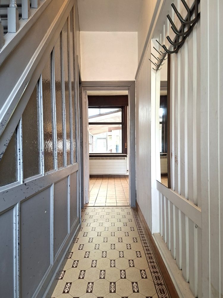 Licht te renoveren woning / 4 slaapkamers en tuin / centrale ligging foto 15