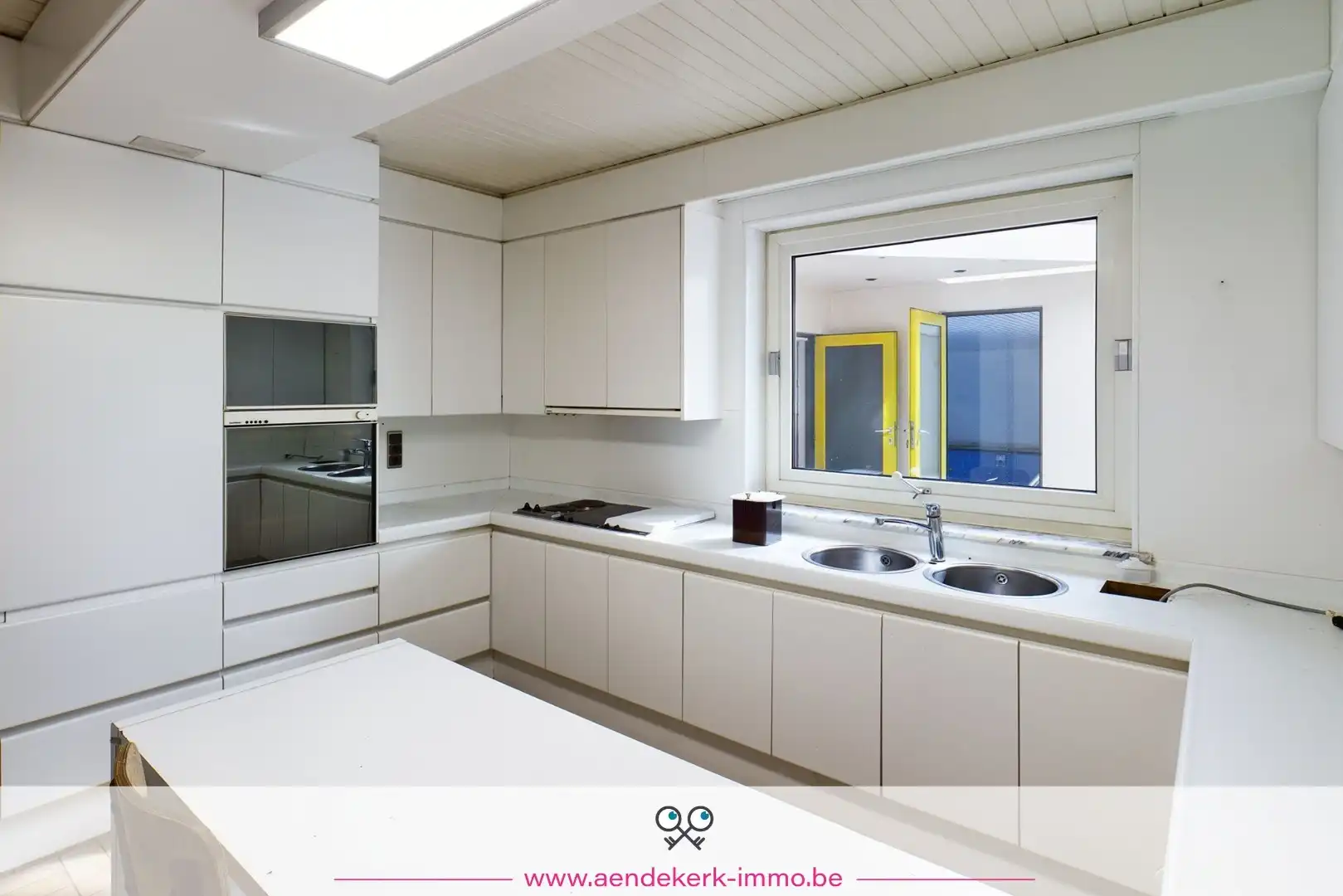 Woning met handelsruimte in het centrum van Kinrooi foto 16