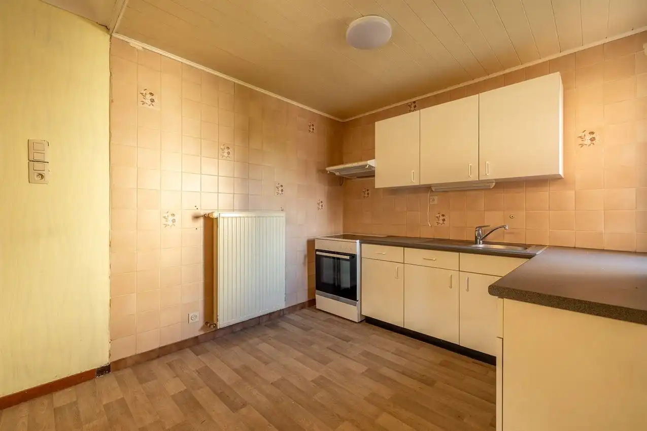 Karaktervolle woning met grote tuin, bijgebouwen en uitbreidbaar zoldervolume op een verrassend diep perceel foto 13
