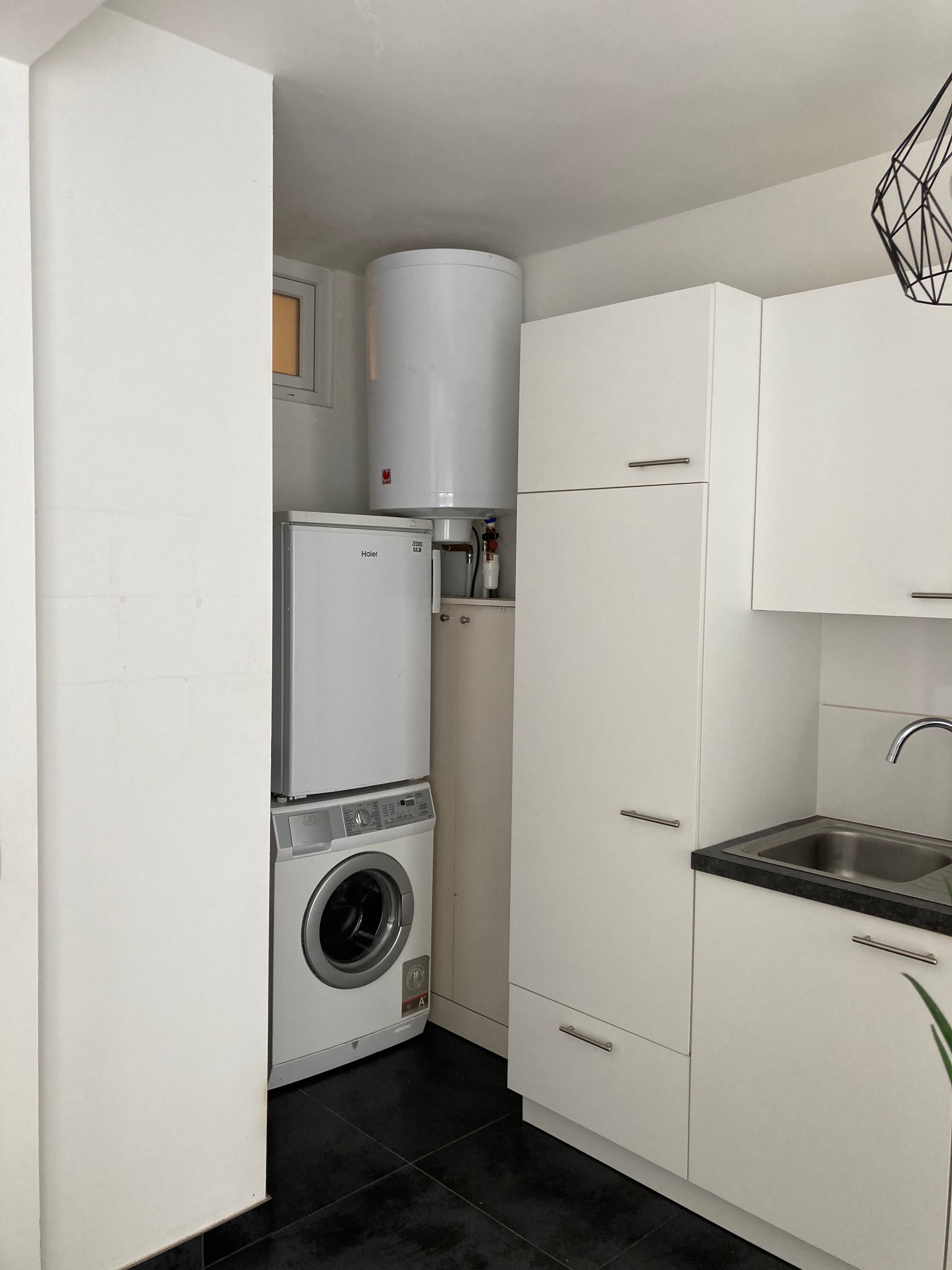 Instapklaar éénslaapkamerappartement met terras in centrum Beveren foto 10