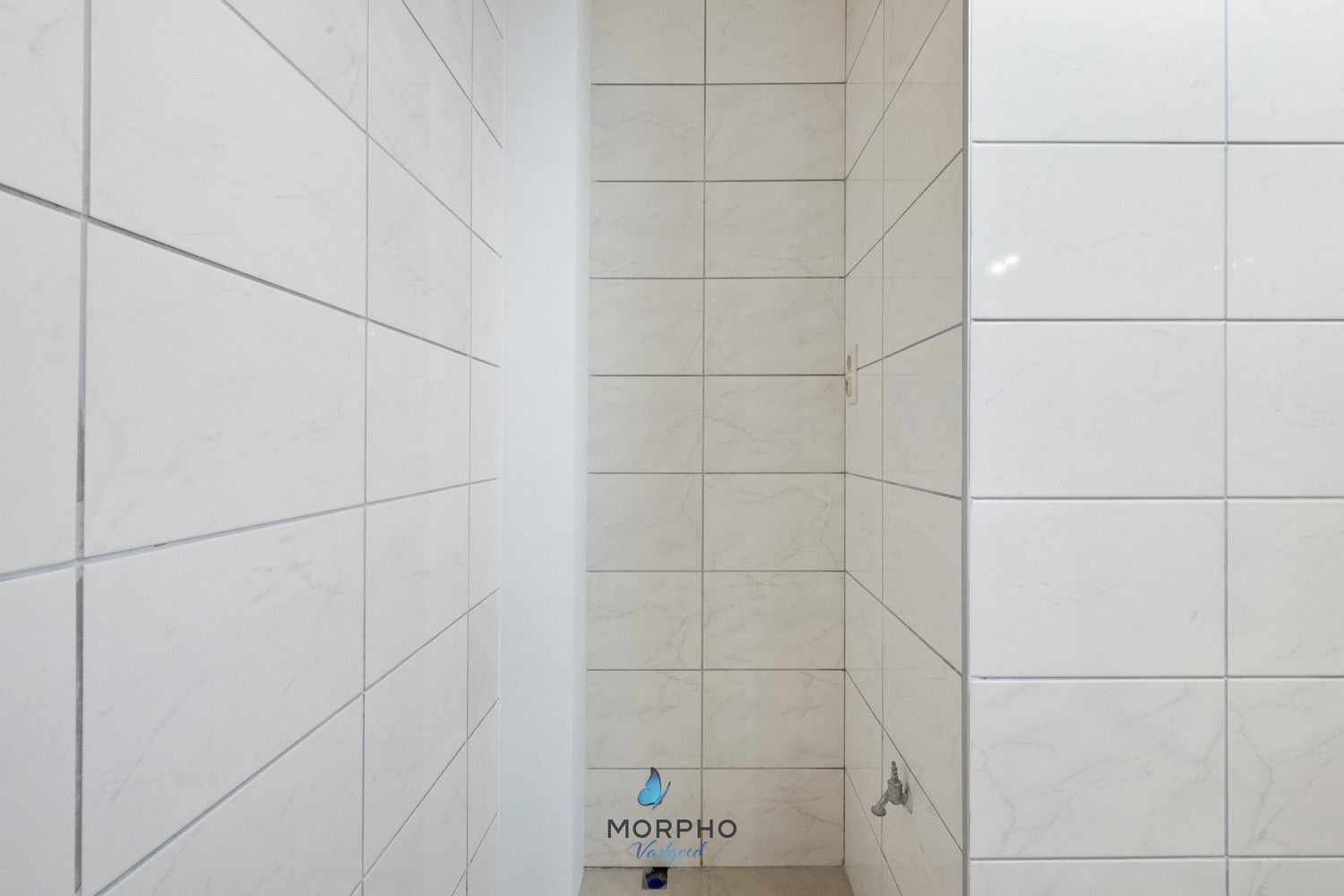 Modern en energiezuinig 2-slaapkamerappartement op de derde verdieping in hartje Temse! foto 14