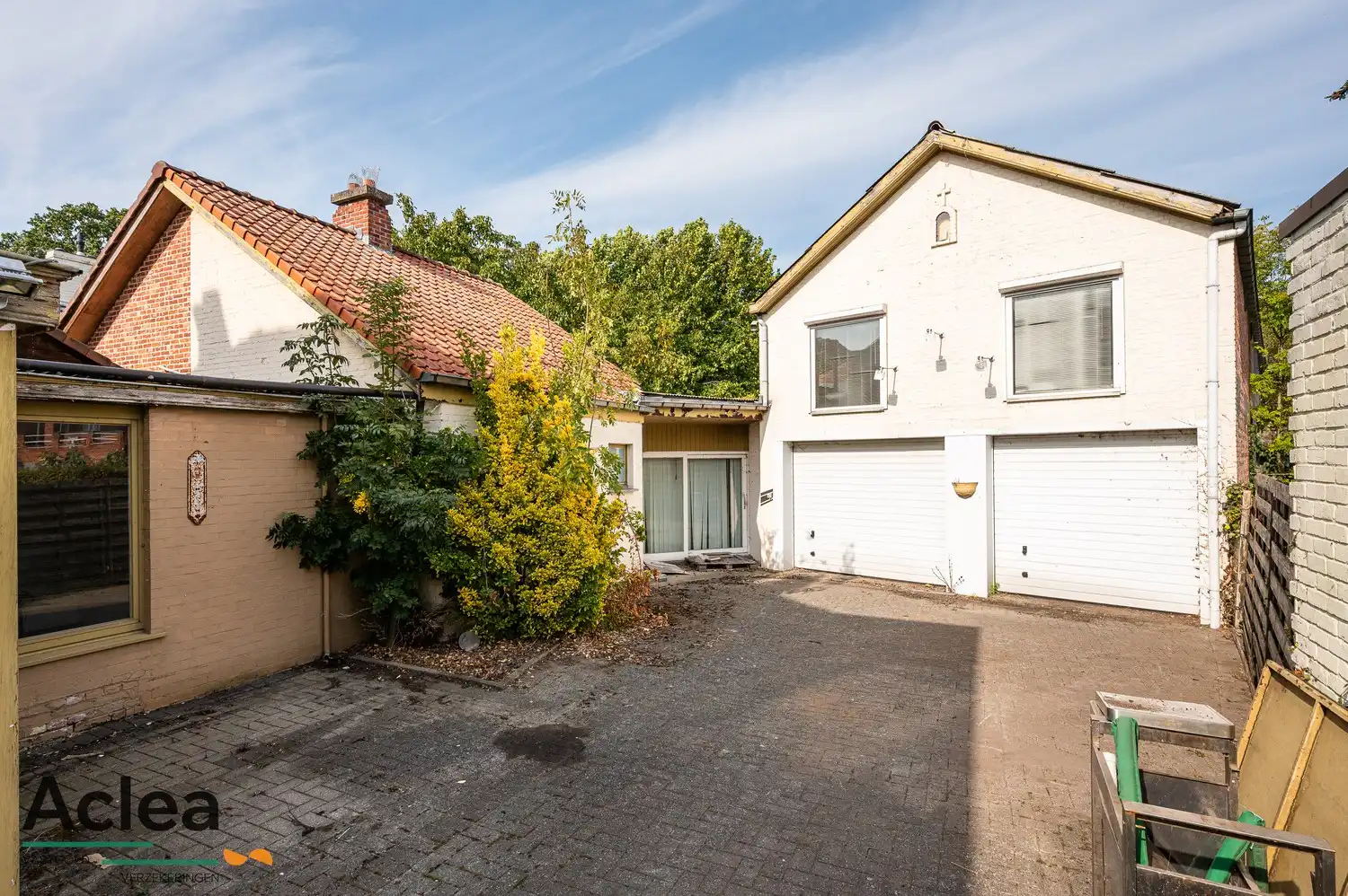 Te renoveren woning met grote magazijnruimte en veel potentieel foto 7