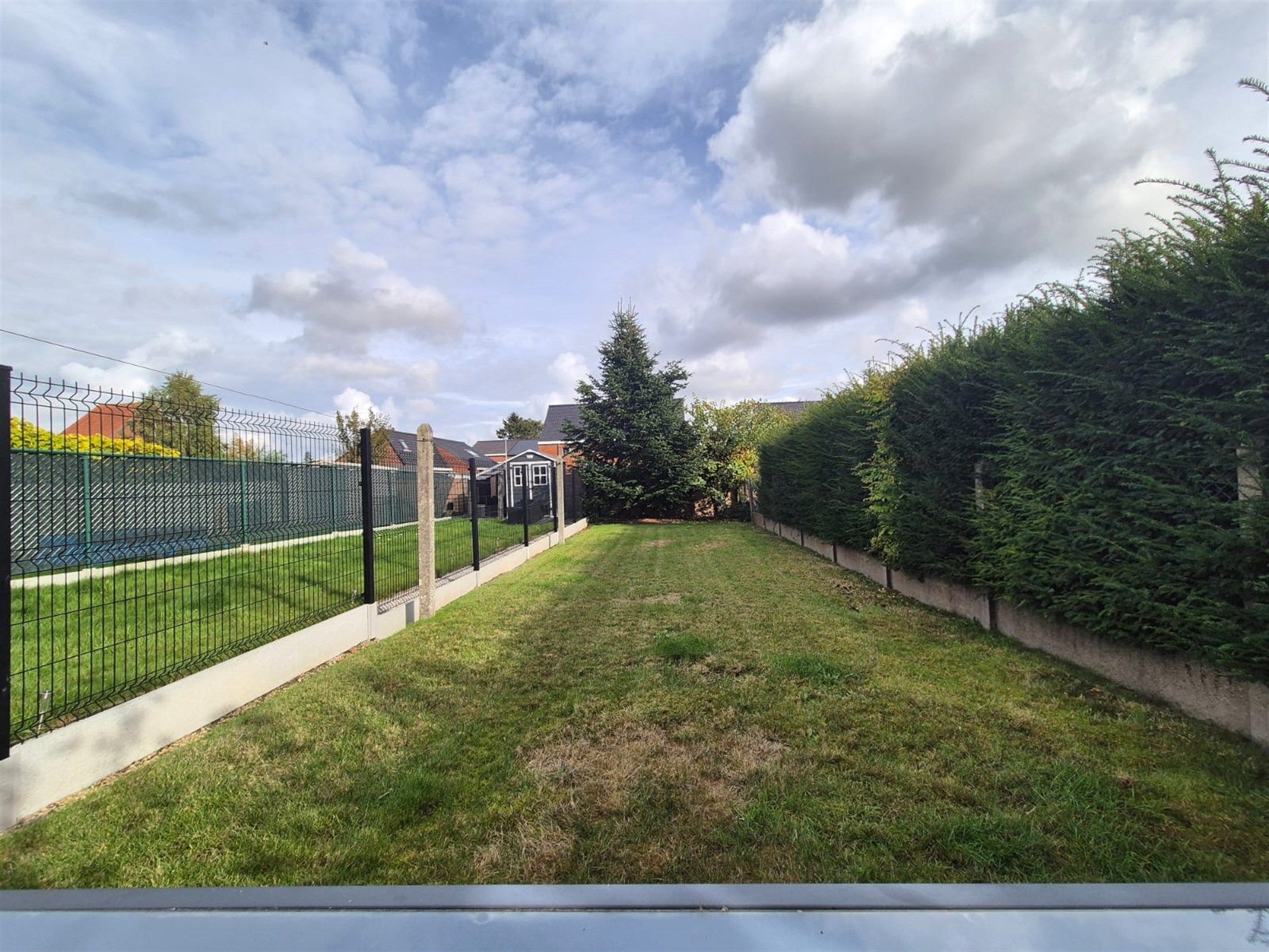 Knusse woning met tuin en garage.  foto 11