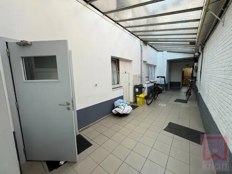 Gebouw met 11 kamerwoningen, centrum Geel op 8a66. foto 4