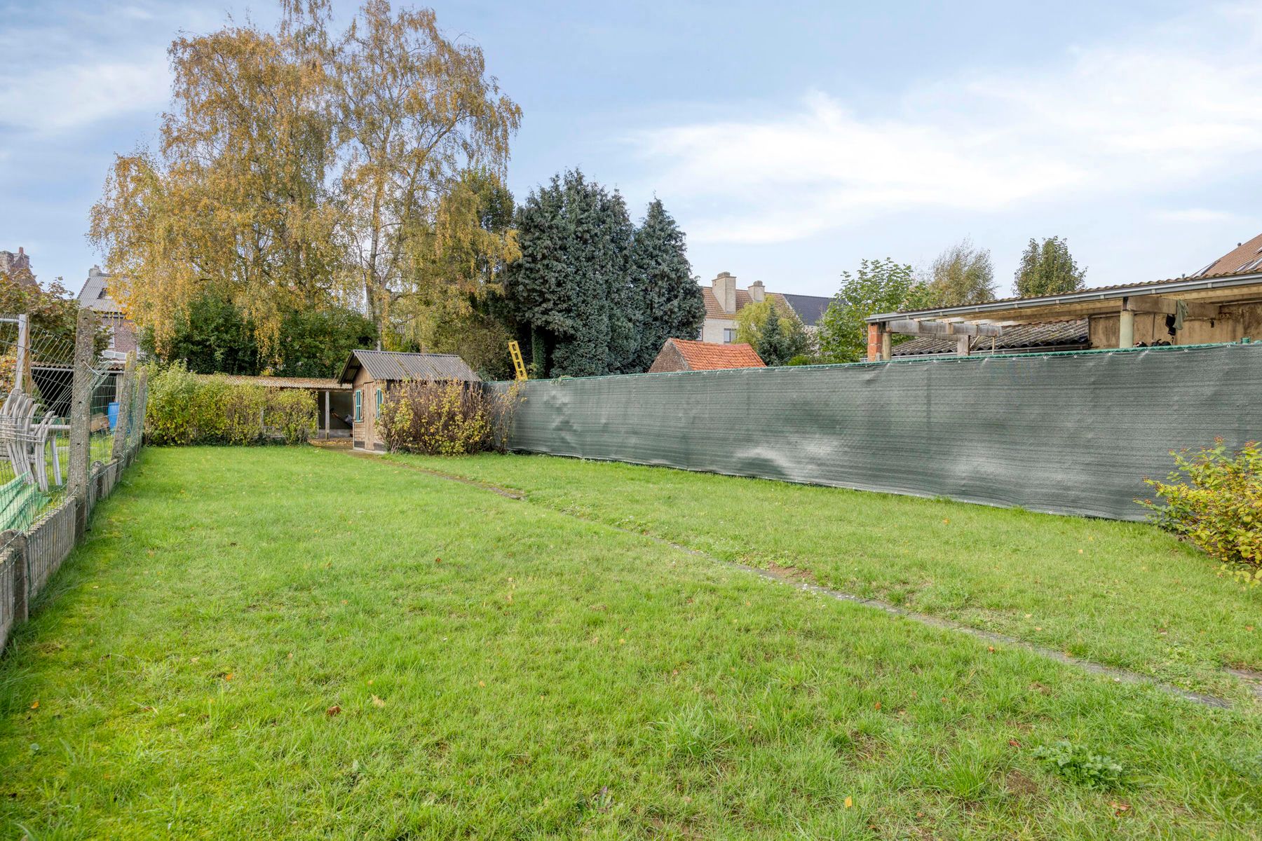 Instapklare woning met 3 slaapkamers en ruime tuin foto 24