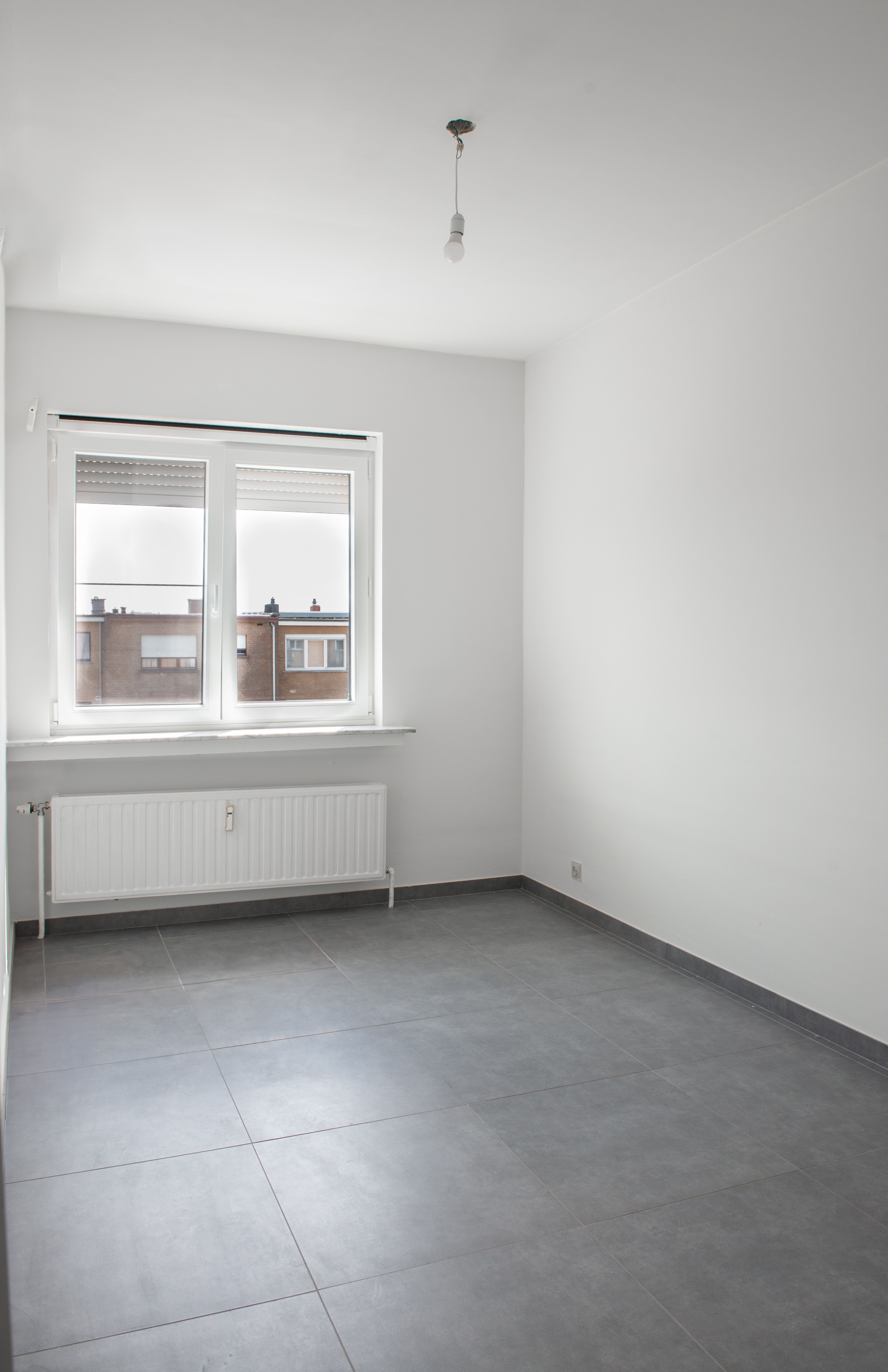 Totaal gerenoveerd appartement met 2 slaapkamers én garagebox met zicht op het groen! foto 6