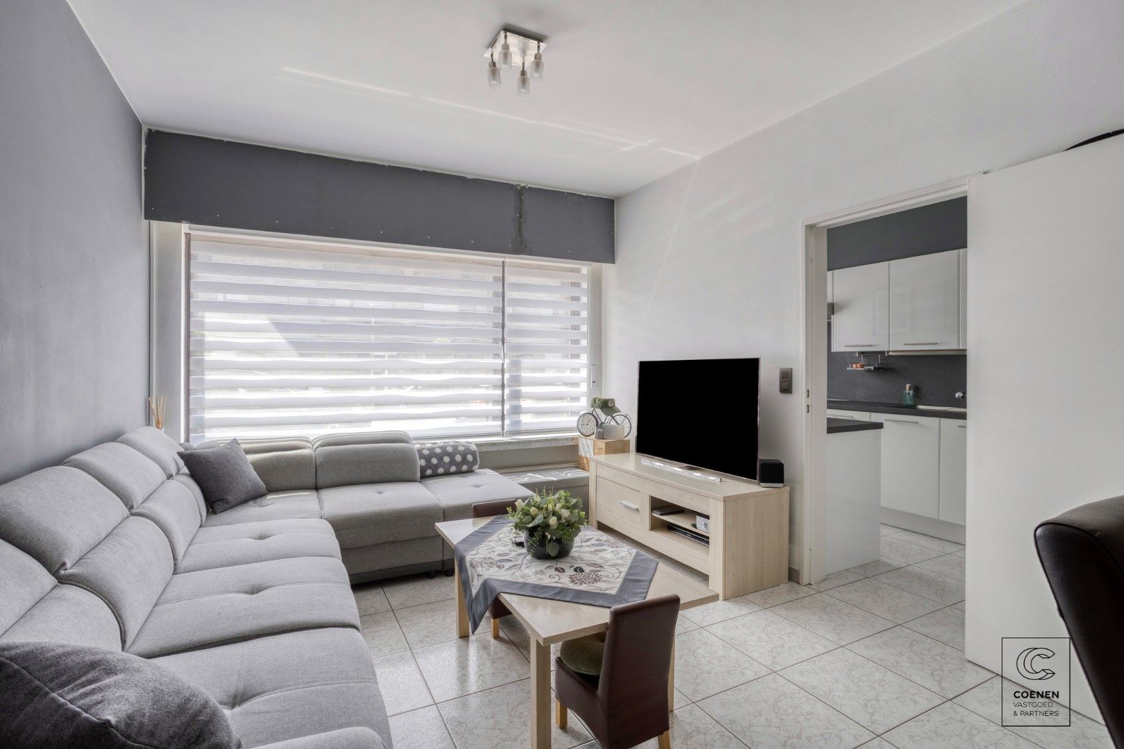 Instapklaar gelijkvloers appartement van 90m² met tuin en garage nabij het centrum van Schoten! foto {{pictureIndex}}
