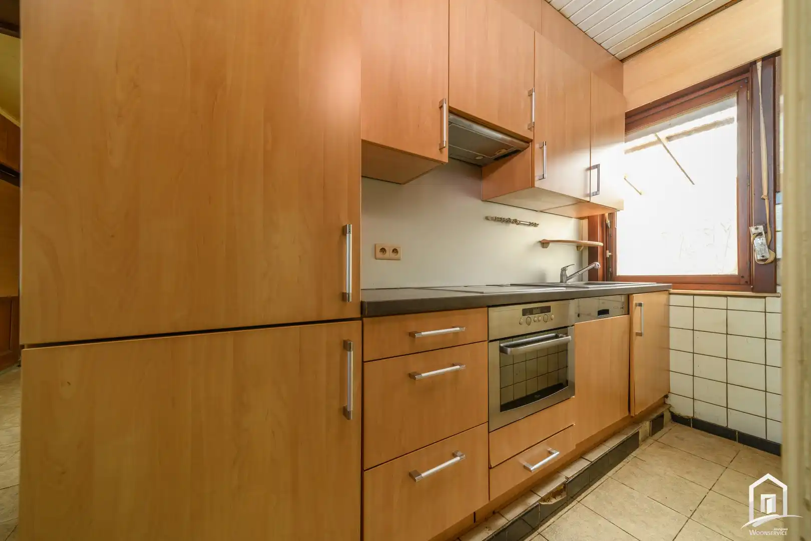 Te renoveren gezinswoning met 2 slaapkamers en ruime tuin foto 9