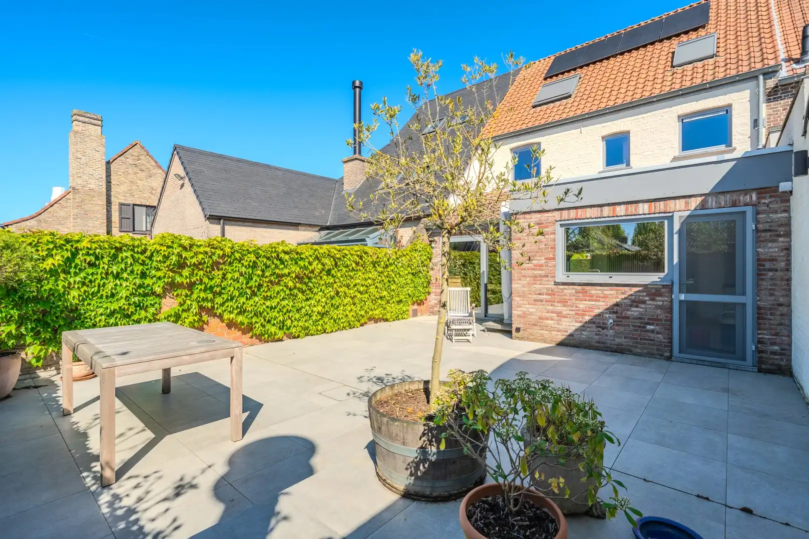 Gezinswoning met 3 à 4 slpks en garage in het centrum foto 4