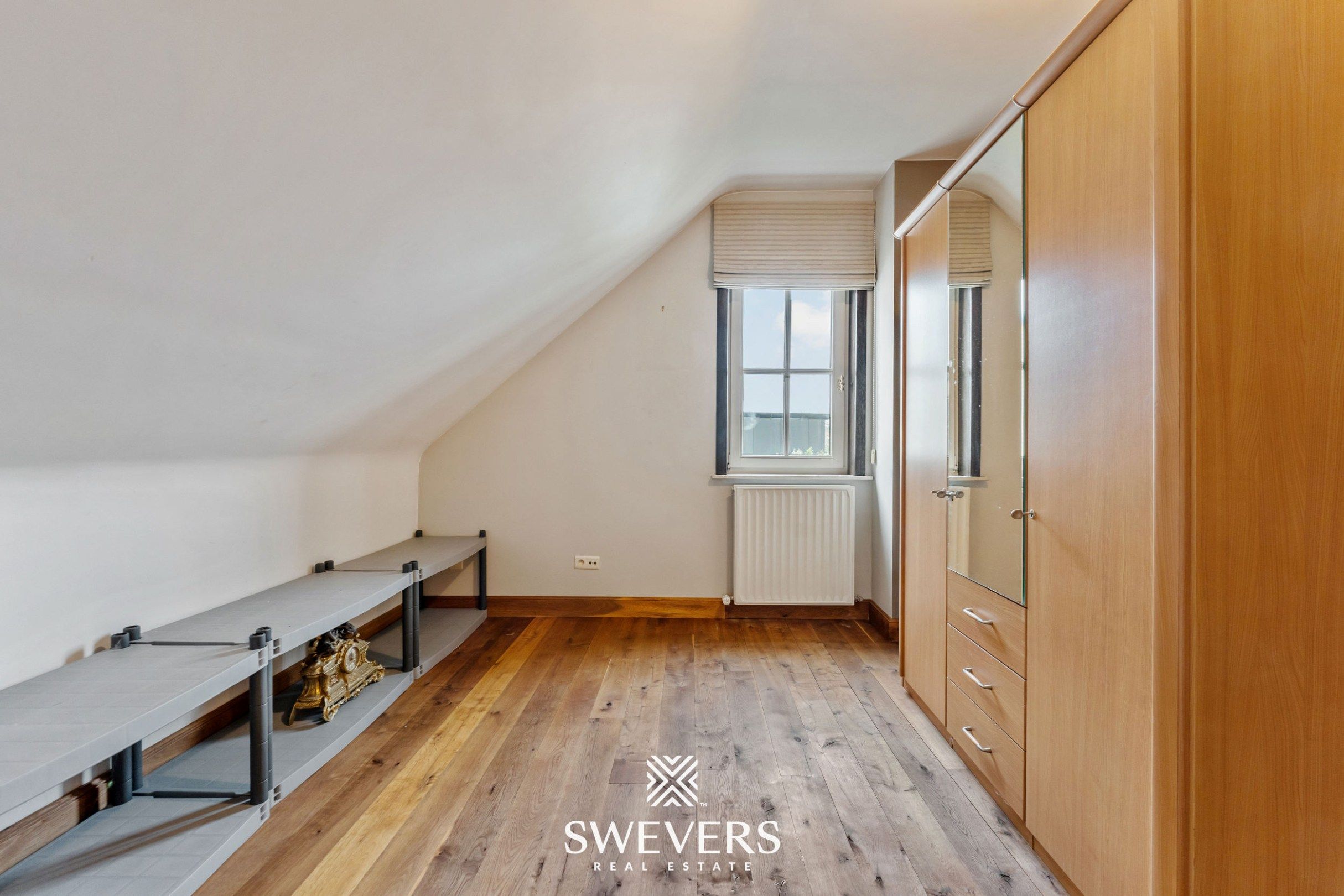 Ruime open bebouwing met 4 slaapkamers en zonnige tuin in Houthalen foto 25