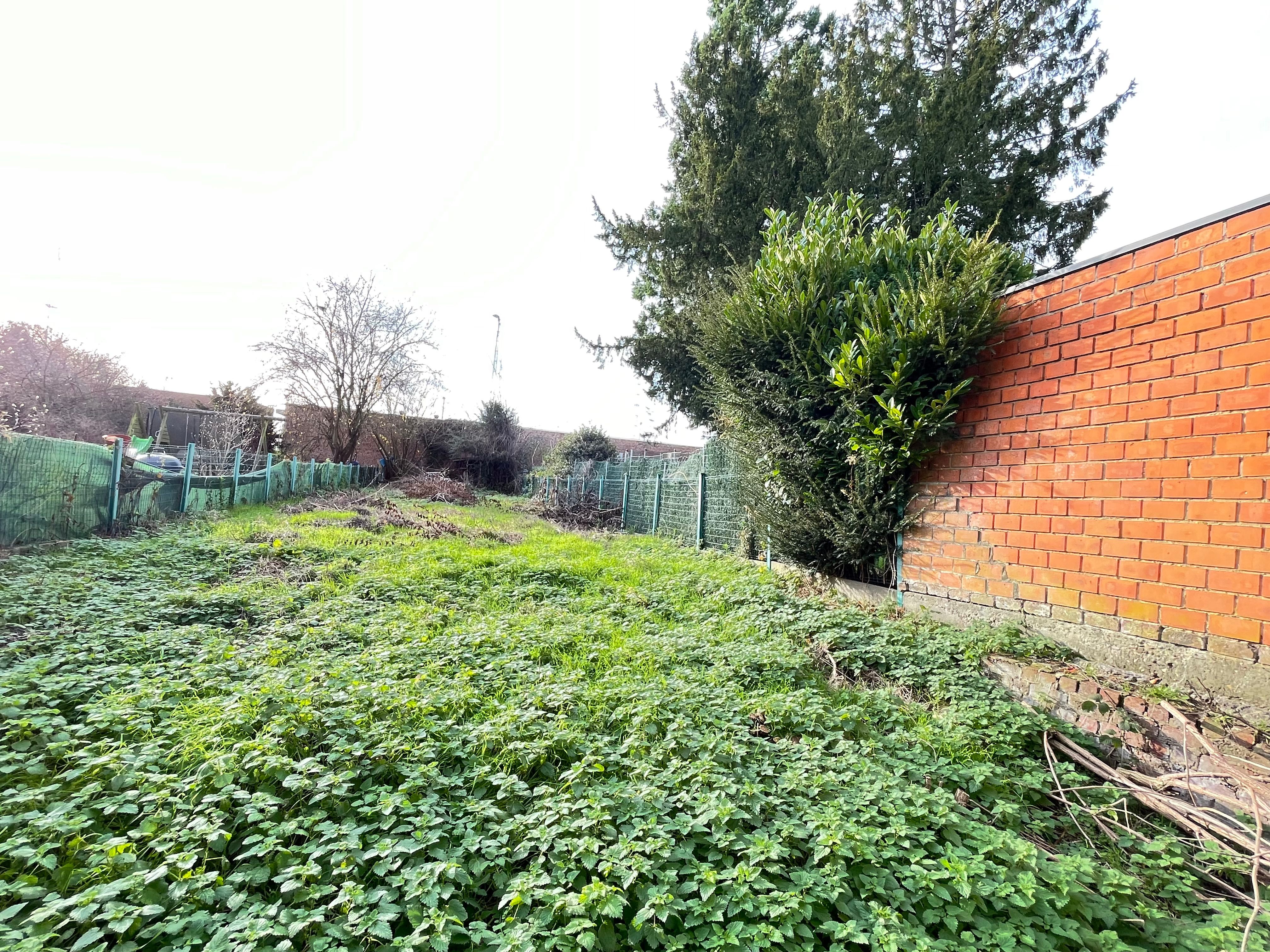 Bouwgrond 2 gevel woning met tuin foto 8