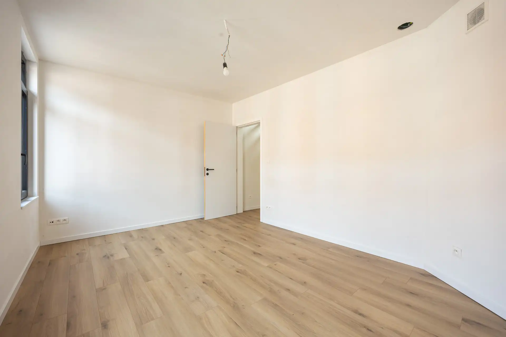 Vernieuwde arbeiderswoning foto 9