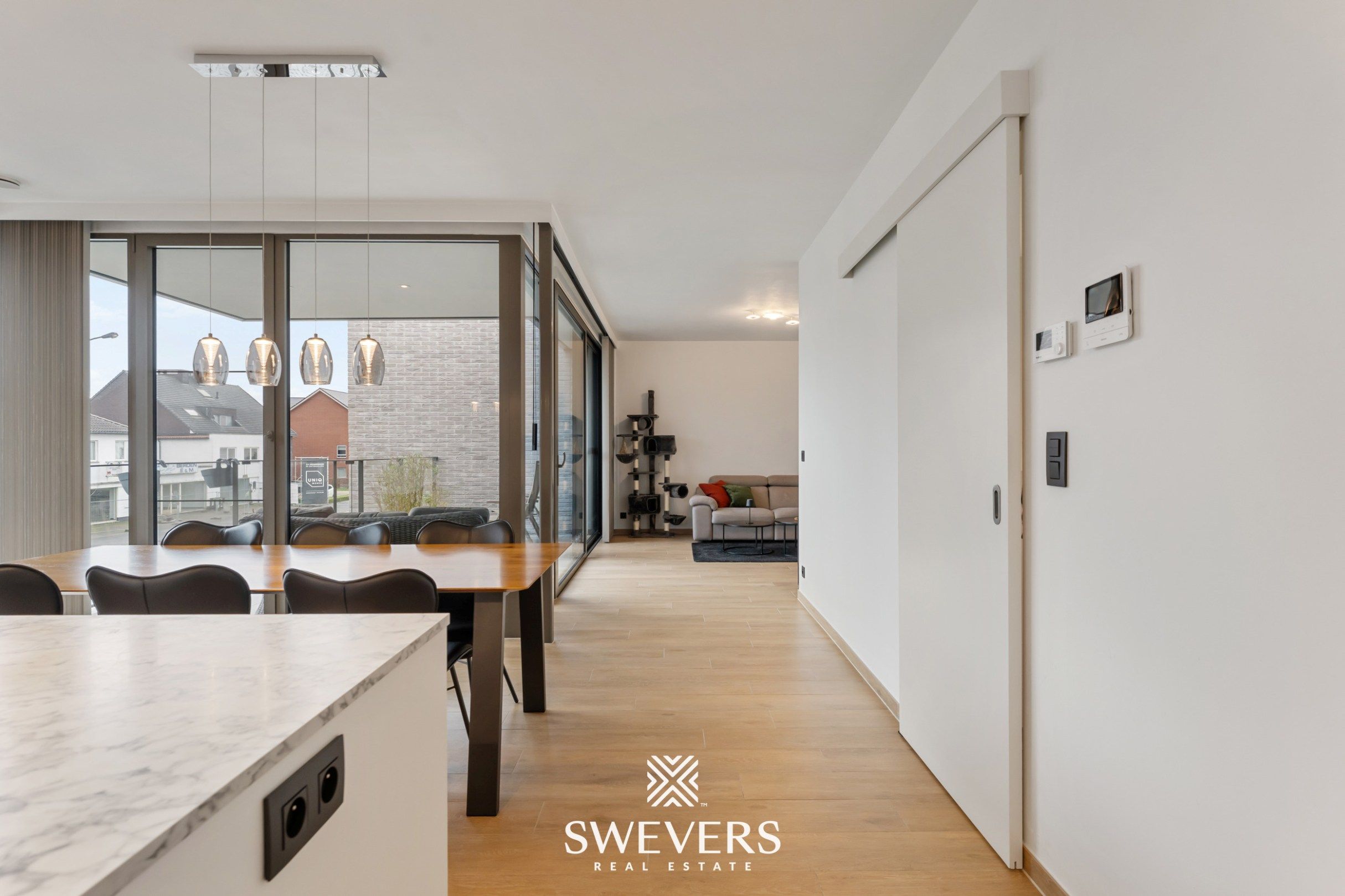 Trendy woning met 2 slpk, 2 bergingen en leuk terras (O) vlakbij centrum Zonhoven foto 3