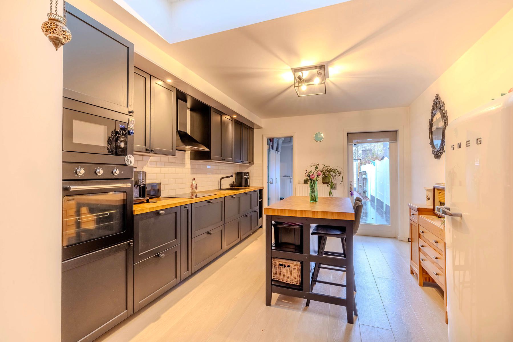 Instapklare woning met 2 slaapkamers en leuke stadstuin foto 6