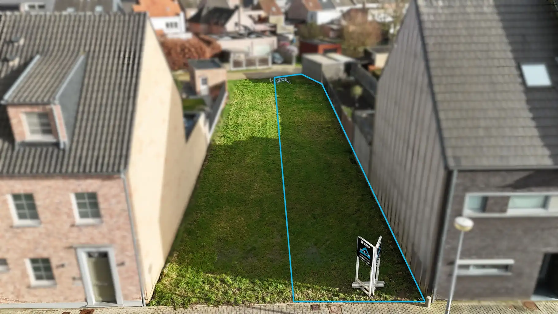 Bouwgrond in Opwijk centrum foto {{pictureIndex}}