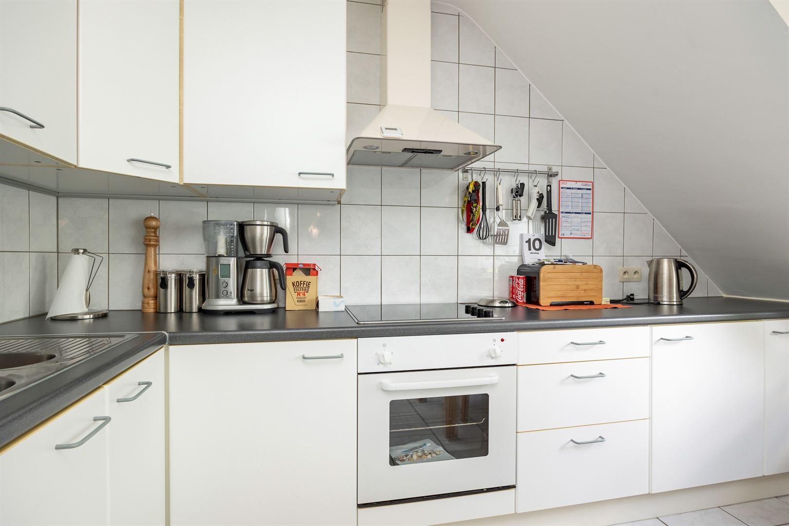 Gerenoveerd studio-appartement met zolder foto 3