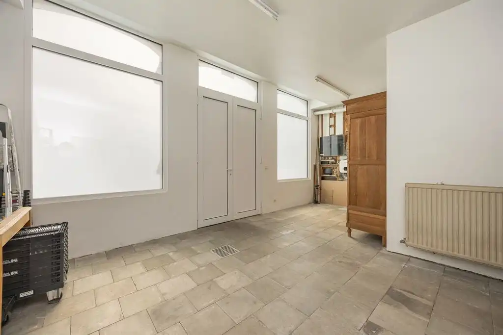 Unieke woning met eclectische gevels en dakterras foto 28