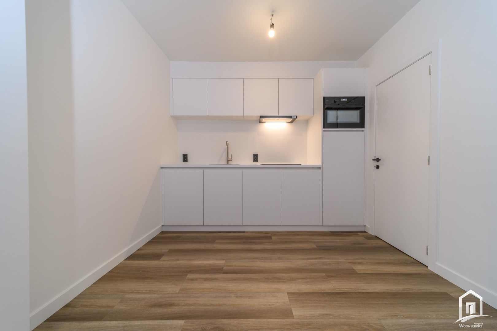 Totaal gerenoveerd gelijkvloers-appartement met tuintje foto 6