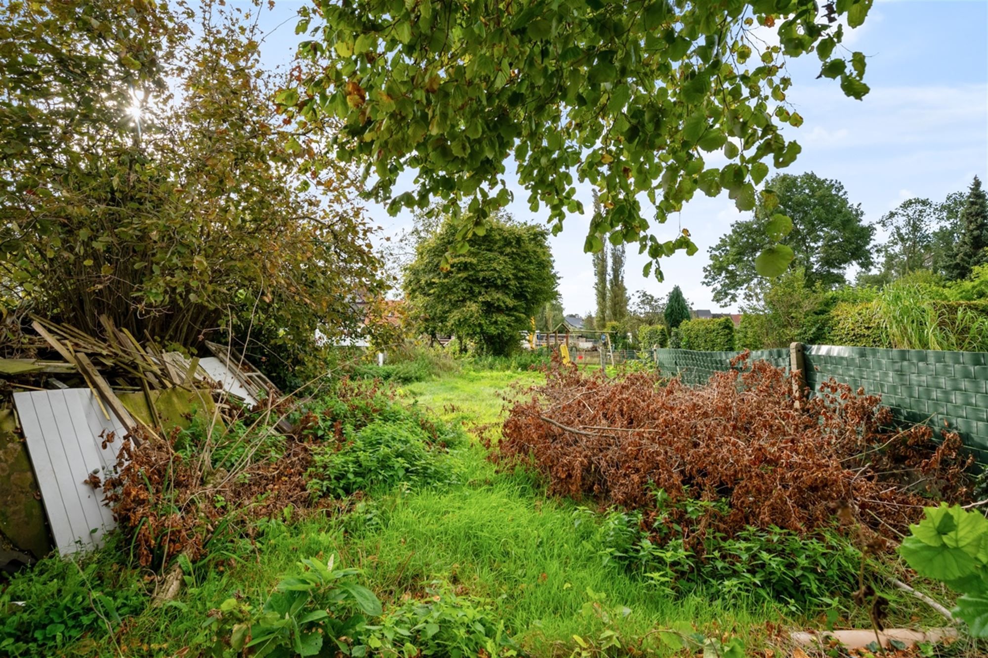 Instapklare woning met 3 slaapkamers, een garage en tuin. foto 9